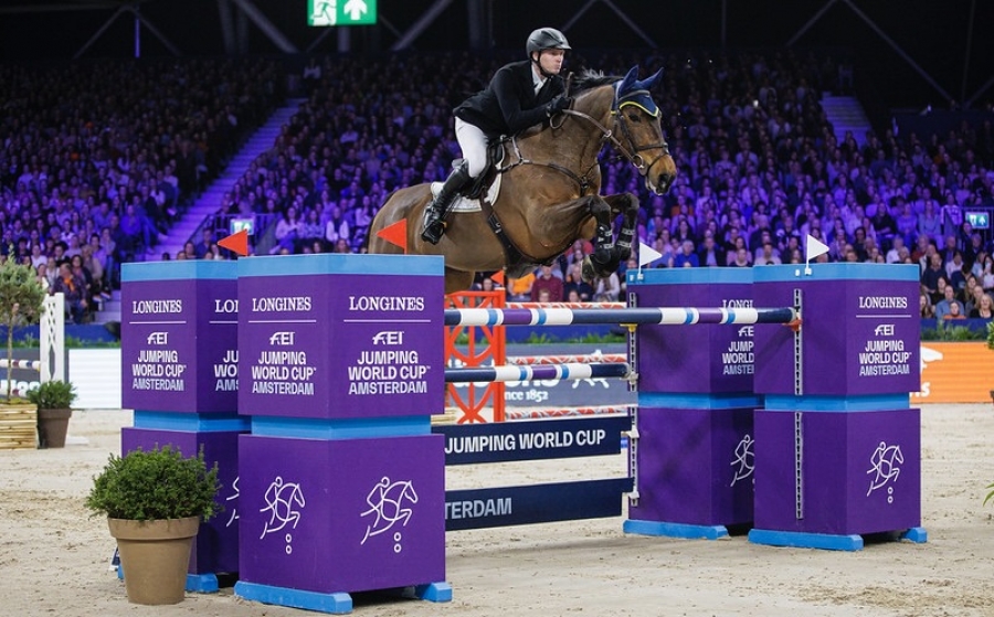 Daniel Coyle (IRL) riding Legacy - winner of the Longines FEI Jumping World Cup™ 2023/24 - Amsterdam (NED)