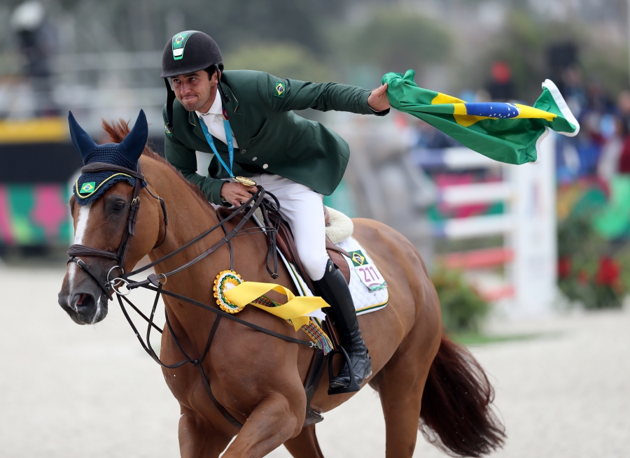 Gold medalist Marlon Modolo of Brazil celebrates after equestrian Jumping Individual at Army Equestrian School on Day 14 of Lima 2019 Pan American Games on August 9, 2019 in Lima, Peru. Photo © Lima 2019